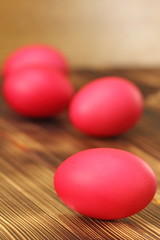 Easter eggs on wooden background
