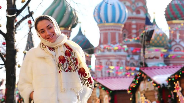Close up, Young beautiful woman on Red Square, Moscow, Russia