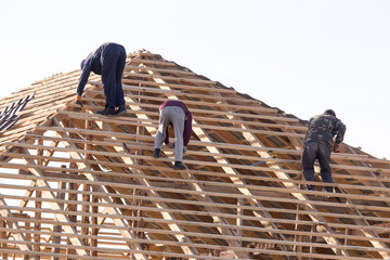 workers working on the roof