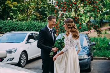 happy bride and groom at a park on their wedding day