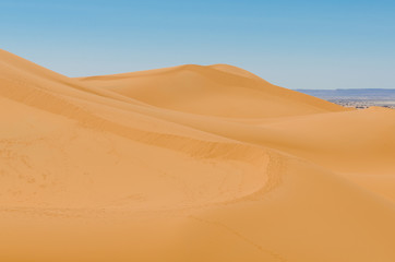 Famous and inconic sahara sand dunes of Erg Chebbi in the Moroccan desert near Merzouga, Morocco, North Africa