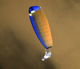Parachute in the sky in the inversion