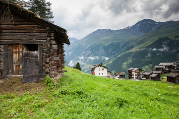 Fototapeta na wymiar House in the beauty of St Moritz, engadin valley . La Sag