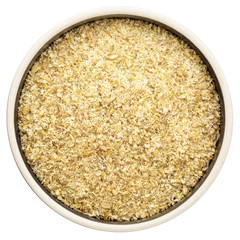 golden flax meal in a round bowl