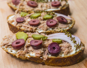 Fototapeta na wymiar Sandwich with tuna and pickles