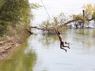 man on the bungee on the river