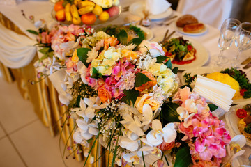 Rich table, decorated with flowers