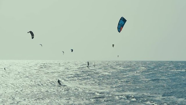 Kite Surfing in Atlantic Ocean, Extreme summer sport. Canary Islands, Spain. Slow motion.