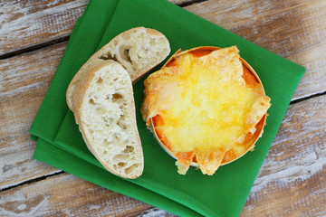 Cheese fondue and slice of fresh ciabatta
