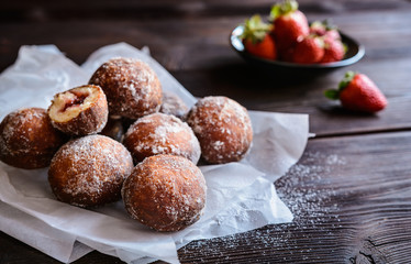 Bomboloni - Italian doughnuts stuffed with strawberry jam