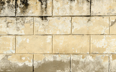 The four horizontal rows of ragged gray bricks