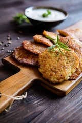 Fried savory pancakes with turkey meat, potato, cheese and herbs