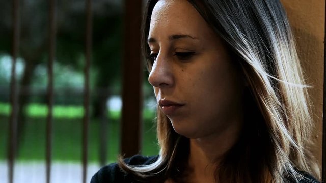 sad and melancholy woman thinks of her ex-boyfriend