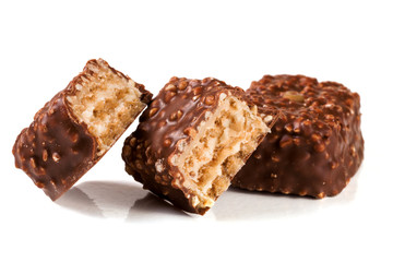 chocolate candy with nuts isolated on white background