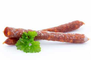 Smoked sausage salami isolated on a white background.