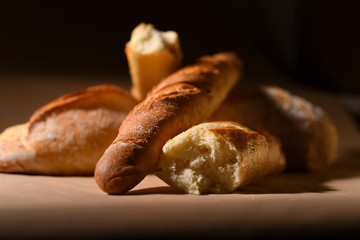 Freshly baked loaves, baguettes and bread from durum wheat varieties