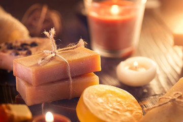Spa. Handmade organic soap closeup. Various soap bars and candles