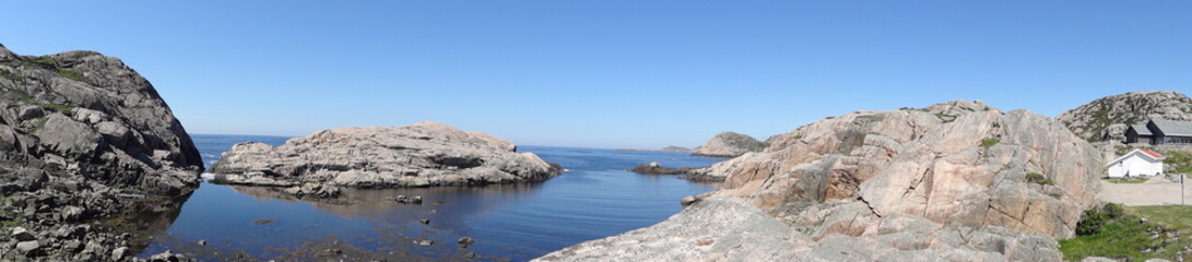 Fototapeta na wymiar Panorama of stony coast near Sjosanden beach and Mandal in Norway