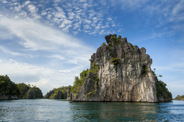 Raja Ampat, Indonesia, is an archipelago comprising over 1,500 small islands comprising hundreds of...