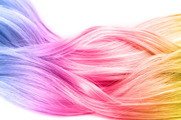 Trendy hairstyle concept. Colorful dyed hair on white background