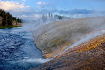Steaming River of Yellowstone at sunset. Midway Geyser Basin. Yellowstone National Park. Jackson Hole. Wyoming. United States.