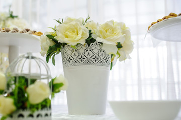 White rose in small metal bucket