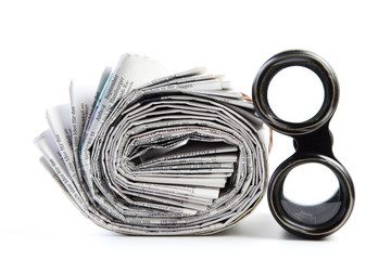 newspaper with spyglass