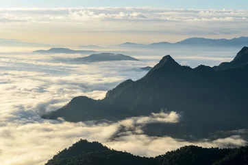 Tafelkleed A view from hill of North Thailand in morning february and sunlight emanate on clouds flow © gexphos