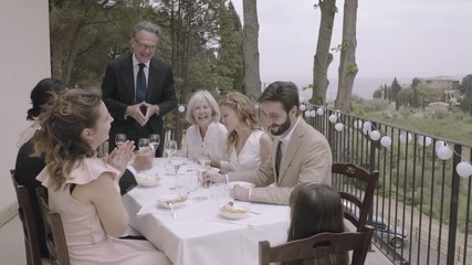 Father giving speech on wedding day - Powered by Adobe