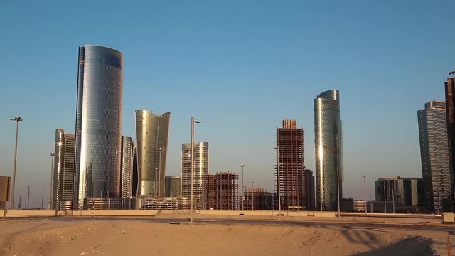 City of Lights complex at Al Reem Island in Abu Dhabi, United Arab Emirates. Abu Dhabi - capital and second most populous city in UAE, after Dubai, and also capital of Abu Dhabi emirate