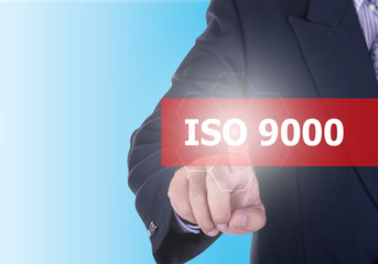 Businessman pressing iso 9000