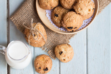 Oatmeal Raisin Cookies on a Plate with Glass of Milk