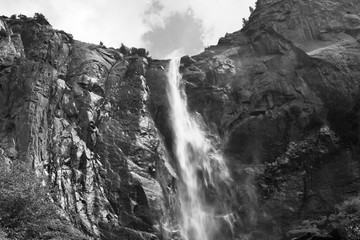 Black & white waterfall.  Bridal veil falls on the Merced River in Yosemite National Park,...