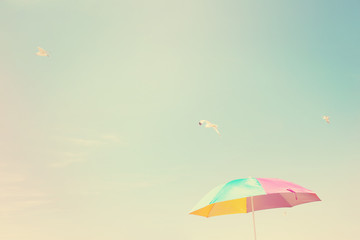 Beach Umbrella with seagulls. Instagram effect