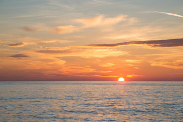 Fototapeta premium Beautiful burning sky at sunrise beach in the morning time