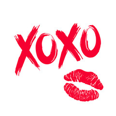 XOXO hugs and kisses brush lettering and lipstick kiss on a white background. Vector. © DruZhi Art