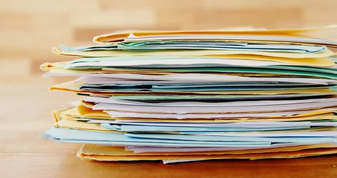 Stack of files on table