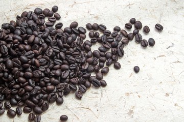 Coffee on grunge wooden background. Fresh coffee beans on wood, ready to brew delicious coffee