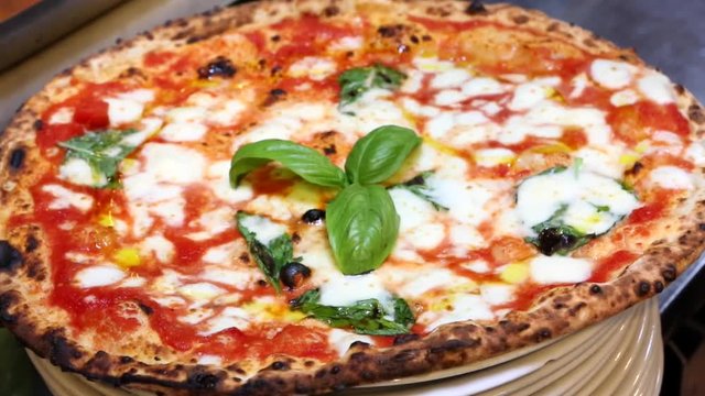 Close up of a very neapolitan pizza margherita