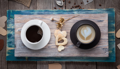 two cup of espresso and cappuccino on the table in a vintage Val