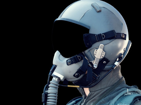 Pilot Wearing Mask And Helmet on black background with copy space.
Military fighter pilot uniform.