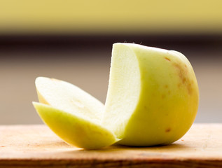 sliced apple on a cutting board