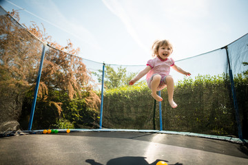 Joy - jumping trampoline - obrazy, fototapety, plakaty