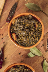 Lentil stew, shot from above, with bay leaves