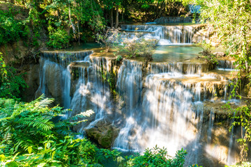 Fototapeta na wymiar Beautiful Waterfall in Deep Forest with Sunlight.