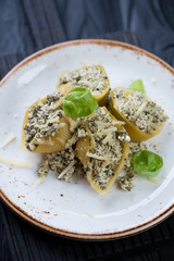 Conchiglioni pasta baked with cottage cheese and spinach