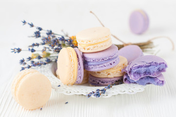 Macaroons with and bouquet of lavender flowers