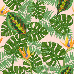 seamless pattern with flowers  birds of paradise and leaves of tropical plants