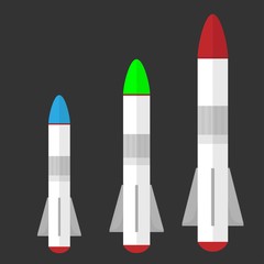 Three rockets for space on gray background
