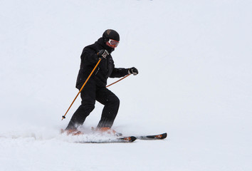Skiers ride the slopes in the mountains, Christmas holidays